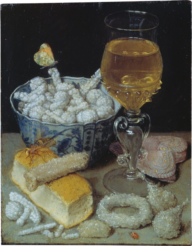 White bread, candied fruit (figs), and a delicate glass of wine. A disproportionately large bee crawls on a sugar stick