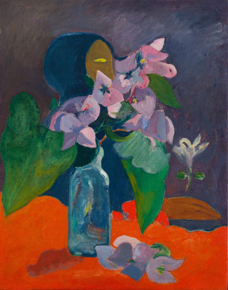A vibrant bouquet of tropical flowers contrasted with a shadowy, enigmatic idol